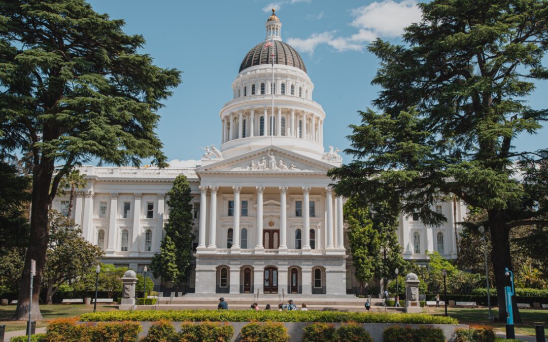 California State Capitol Building framed by trees on both sides